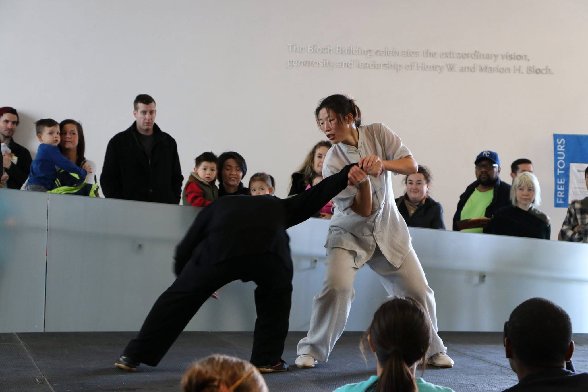 Master Chen Huixian demonstrating Chen Taijiquan leverage and balance with a partner at the Nelson-Atkins Museum of Art
