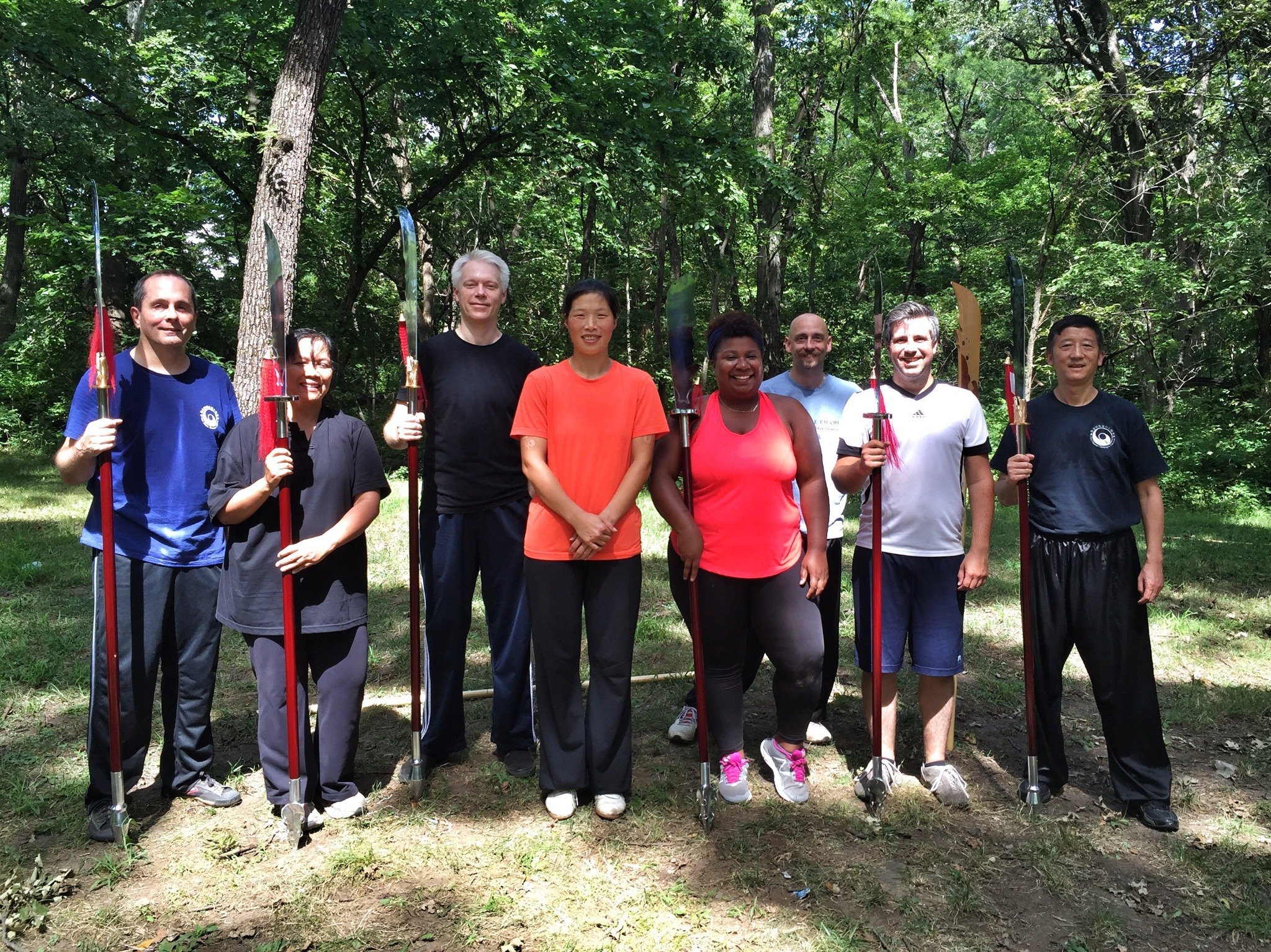 Master Chen Huixian with students holding Chen Taiji spears
